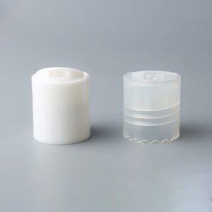 Disc top cap flip top cap