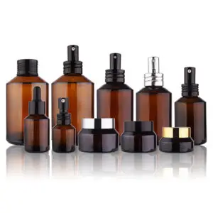 Slanted shoulder glass bottles